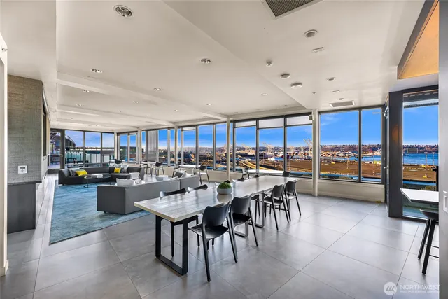 a dining room with furniture and window