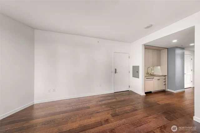 a kitchen with stainless steel appliances a stove top oven and sink