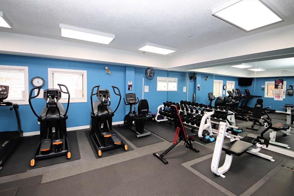 175 Cottage Street, Unit 501 Chelsea, MA 02150 - Photo 34 of 42 a view of a room with gym equipment