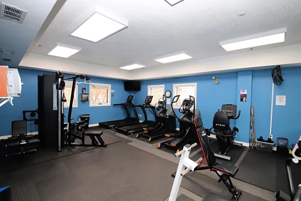 a view of a room with gym equipment