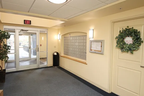 a view of empty room with floor to ceiling window