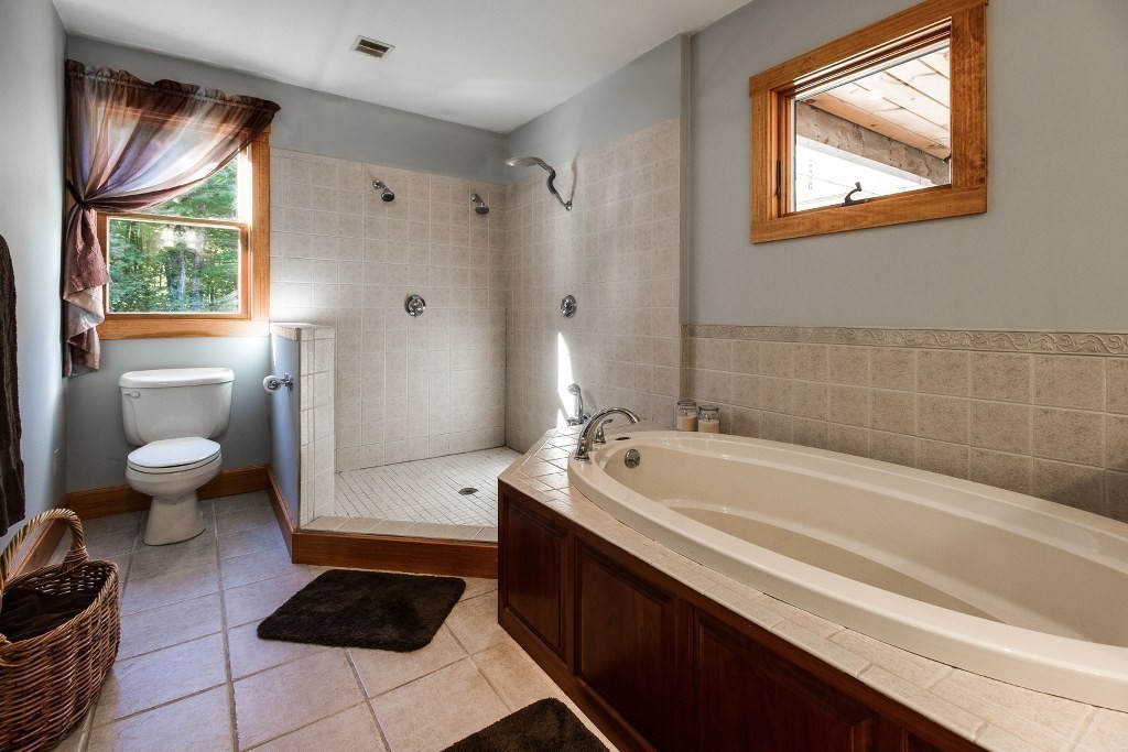 67 Campbell Street Rutland, MA 01543 - Photo 17 of 30 a spacious bathroom with a toilet a sink and bathtub