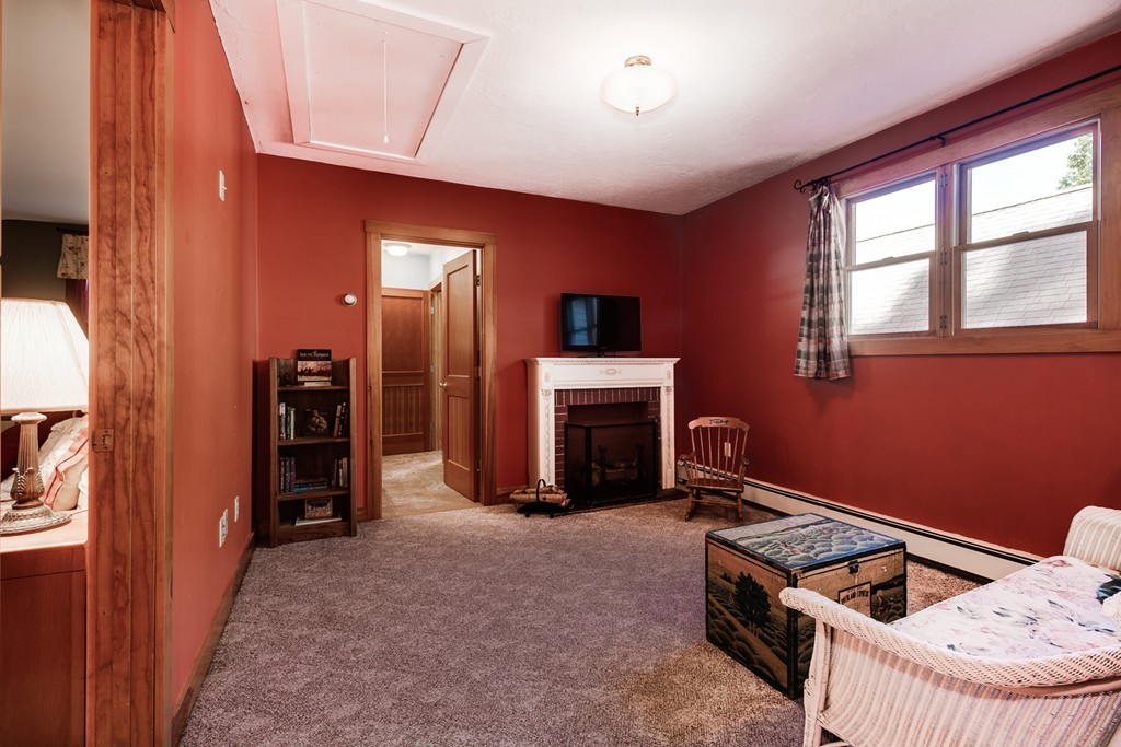 67 Campbell Street Rutland, MA 01543 - Photo 19 of 30 a room with furniture and a fireplace