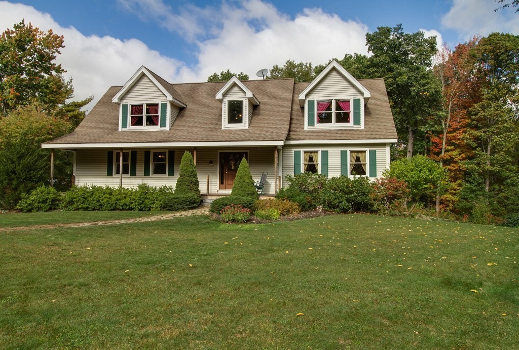 67 Campbell Street Rutland, MA 01543 - Photo 2 of 30 a view of a yard in front of a house