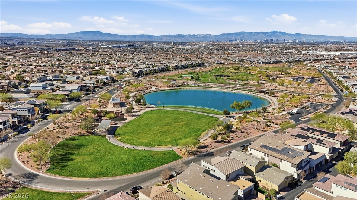250 Dedication Avenue Henderson, NV 89011 - Photo 55 of 67 Aerial perspective of suburban area featuring a water and mountain view