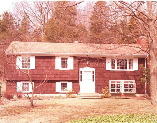 25 Diamond Hill Road Redding, CT 06896 - Photo 1 of 1 a front view of a house with a yard