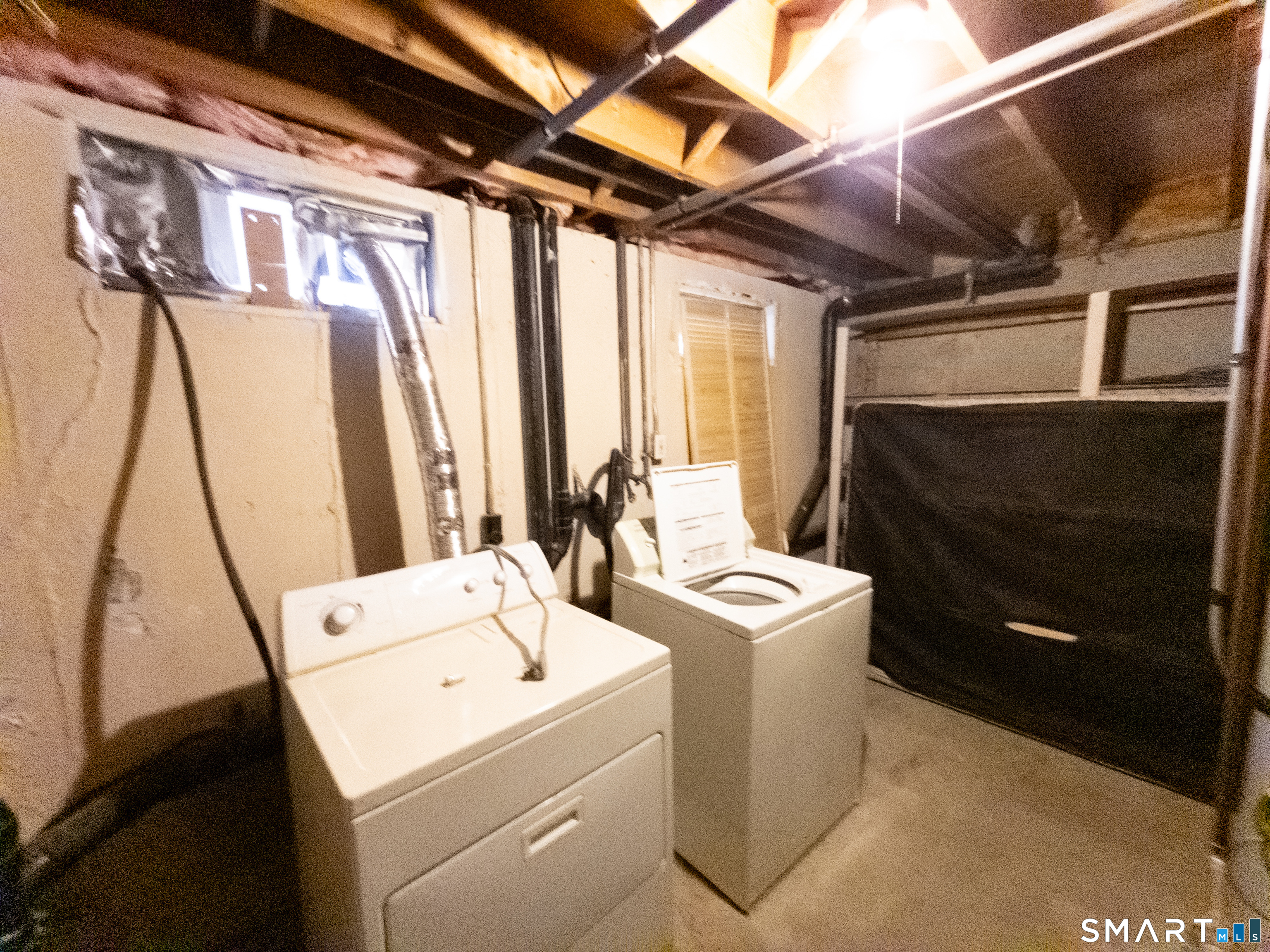 40 Grove Street, Unit B Manchester, CT 06042 - Photo 12 of 13 a utility room with dryer and washer