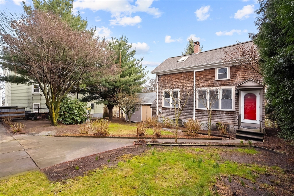 572 William Street Fall River, MA 02721 - Photo 2 of 31 a view of a house with swimming pool and sitting area