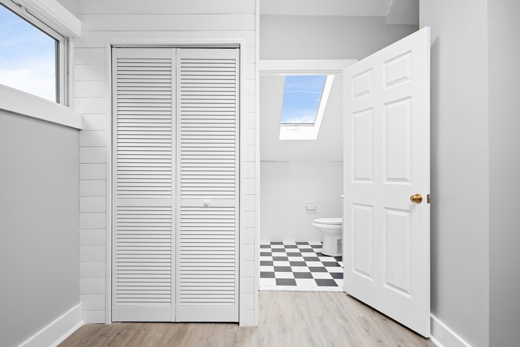 572 William Street Fall River, MA 02721 - Photo 21 of 31 a view of wooden floor and windows in a room