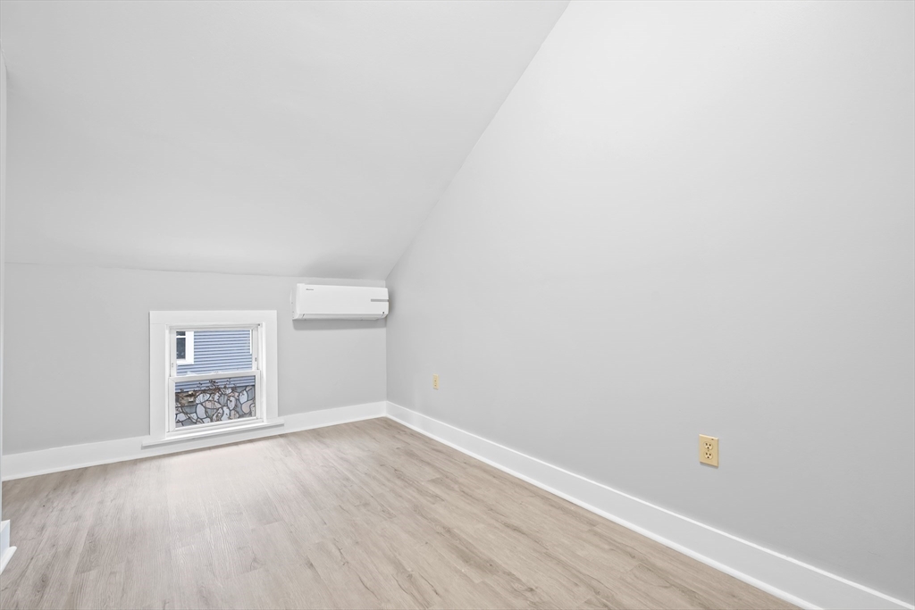 572 William Street Fall River, MA 02721 - Photo 24 of 31 a view of an empty room and wooden floor