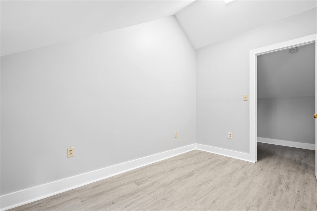 572 William Street Fall River, MA 02721 - Photo 25 of 31 a view of an empty room with wooden floor