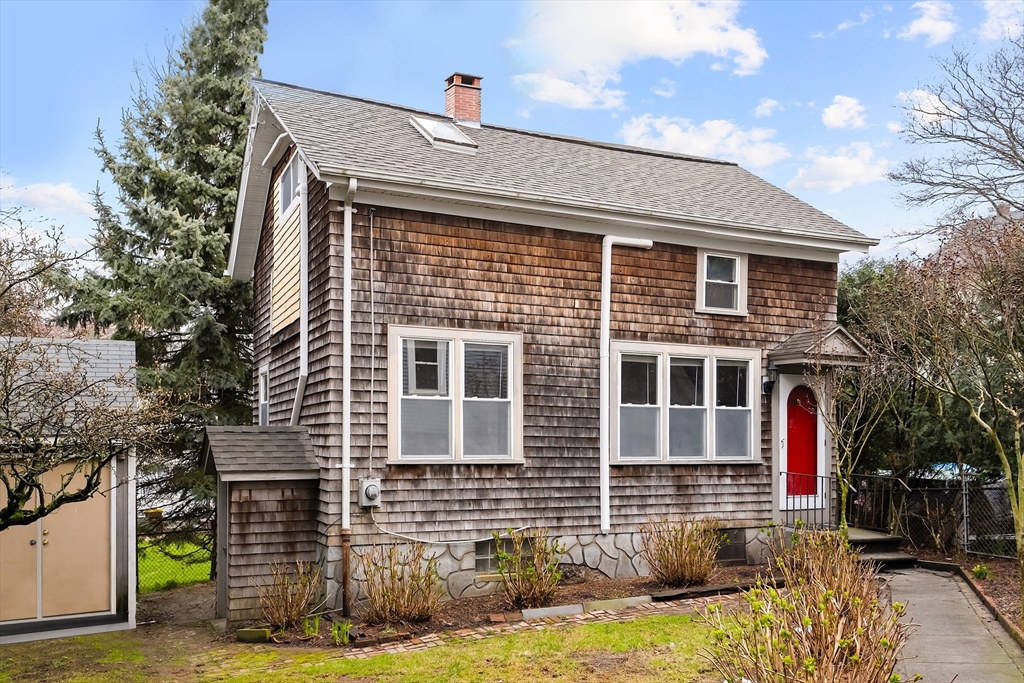 572 William Street Fall River, MA 02721 - Photo 26 of 31 a front view of a house with a yard