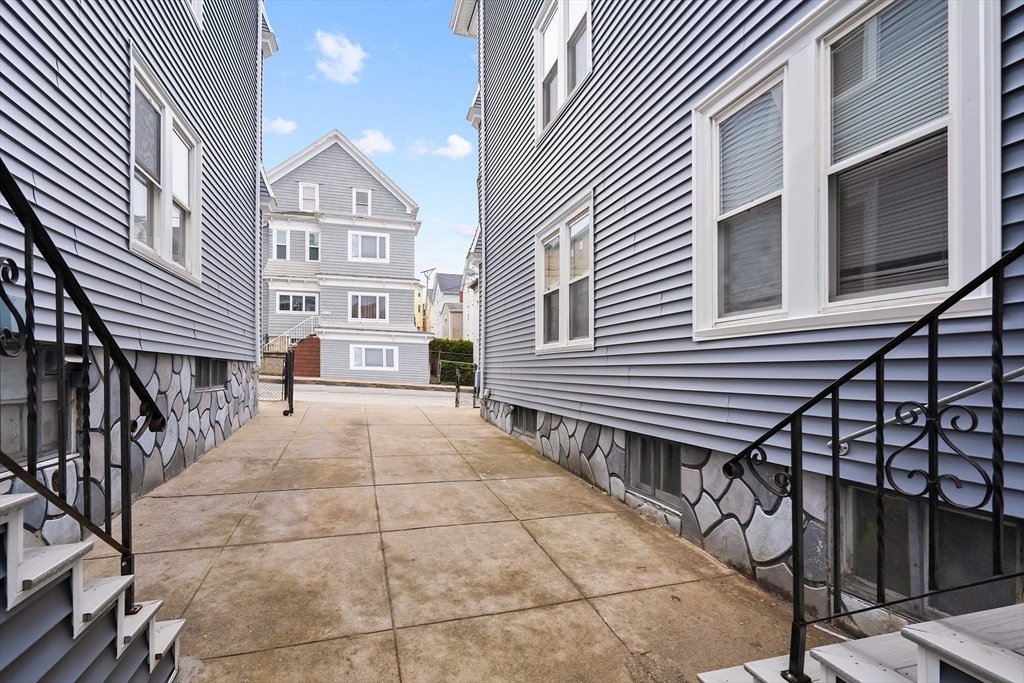 572 William Street Fall River, MA 02721 - Photo 30 of 31 a view of a house with a street