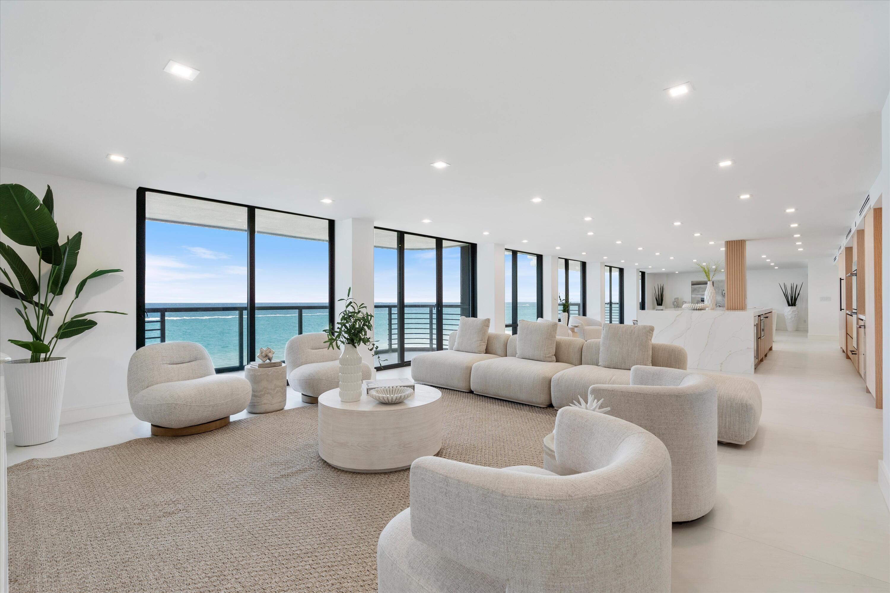250 South Ocean Boulevard, Unit 3E & 3F Boca Raton, FL 33432 - Photo 3 of 46 a living room with furniture and a large window