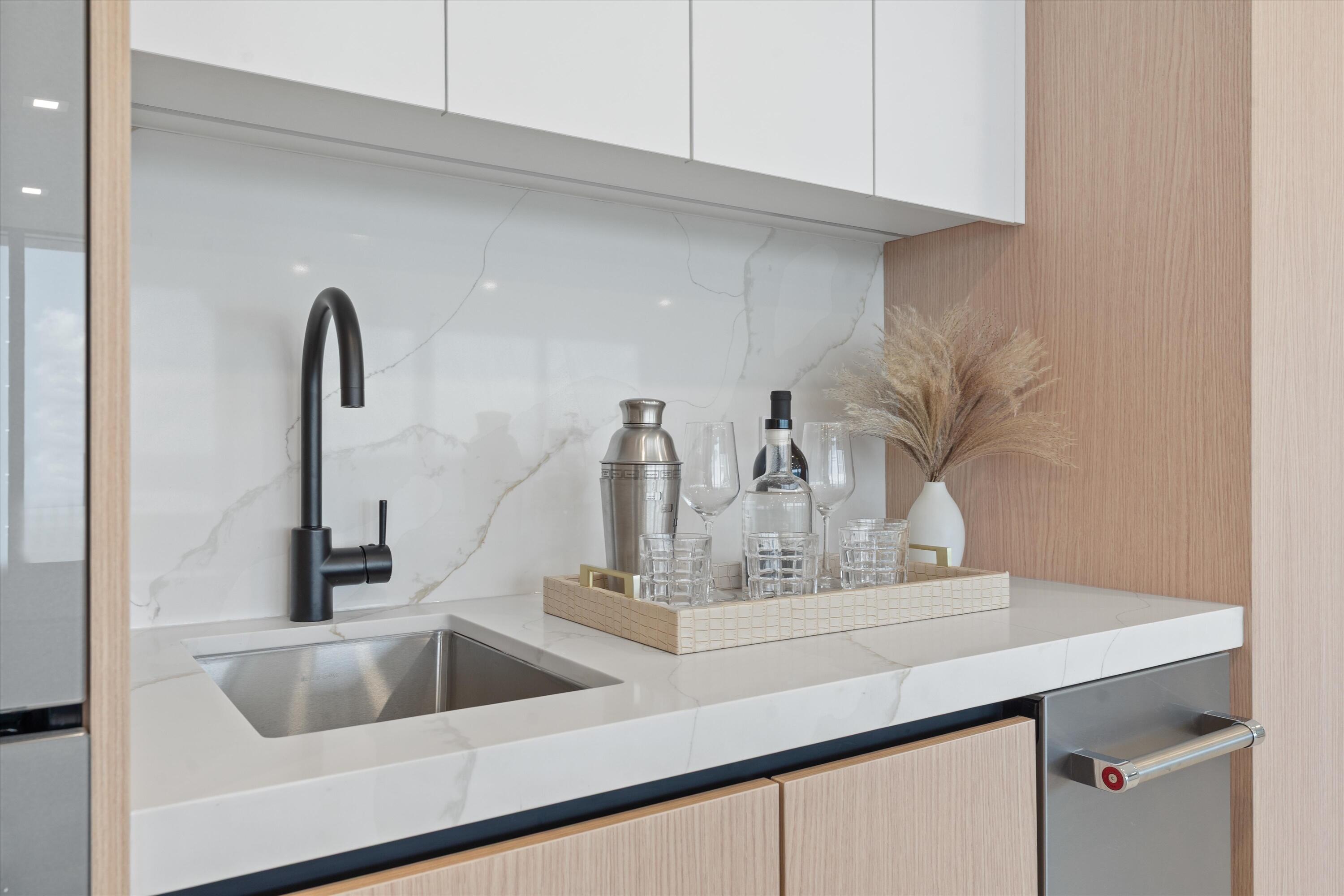 250 South Ocean Boulevard, Unit 3E & 3F Boca Raton, FL 33432 - Photo 7 of 46 a close view of sink and tap