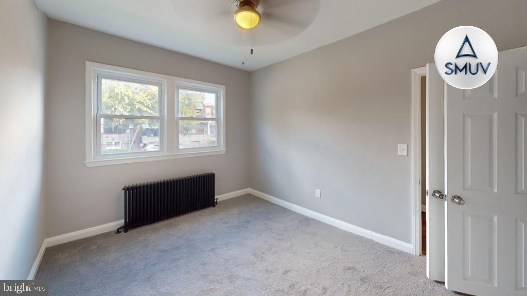 1605 Homestead Street, Unit 1 Baltimore, MD 21218 - Photo 13 of 18 a view of an empty room with a window
