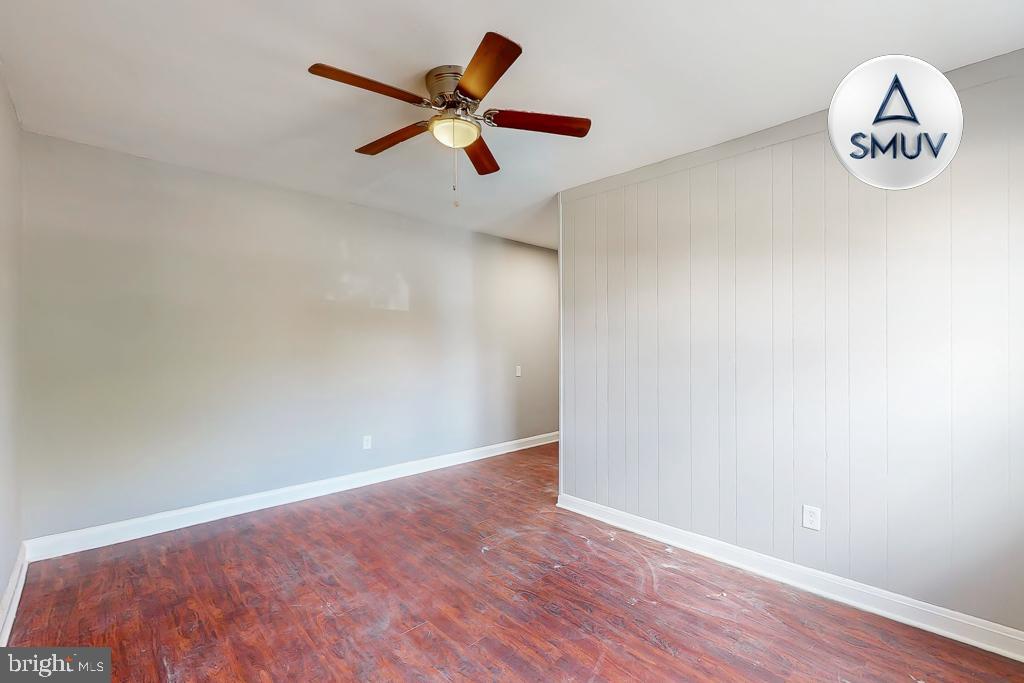 1605 Homestead Street, Unit 1 Baltimore, MD 21218 - Photo 2 of 18 an empty room with a window
