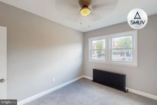 a view of a large window with a fan