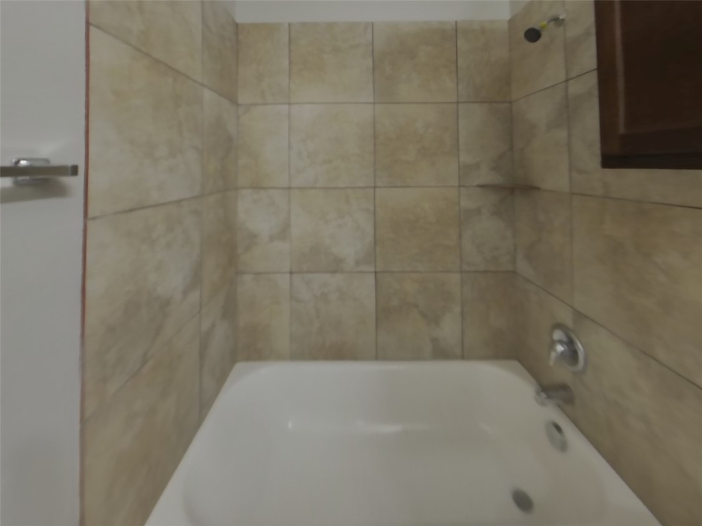 1027 Trail Driver Cove Georgetown, TX 78626 - Photo 11 of 17 Bathroom with shower / tub combination