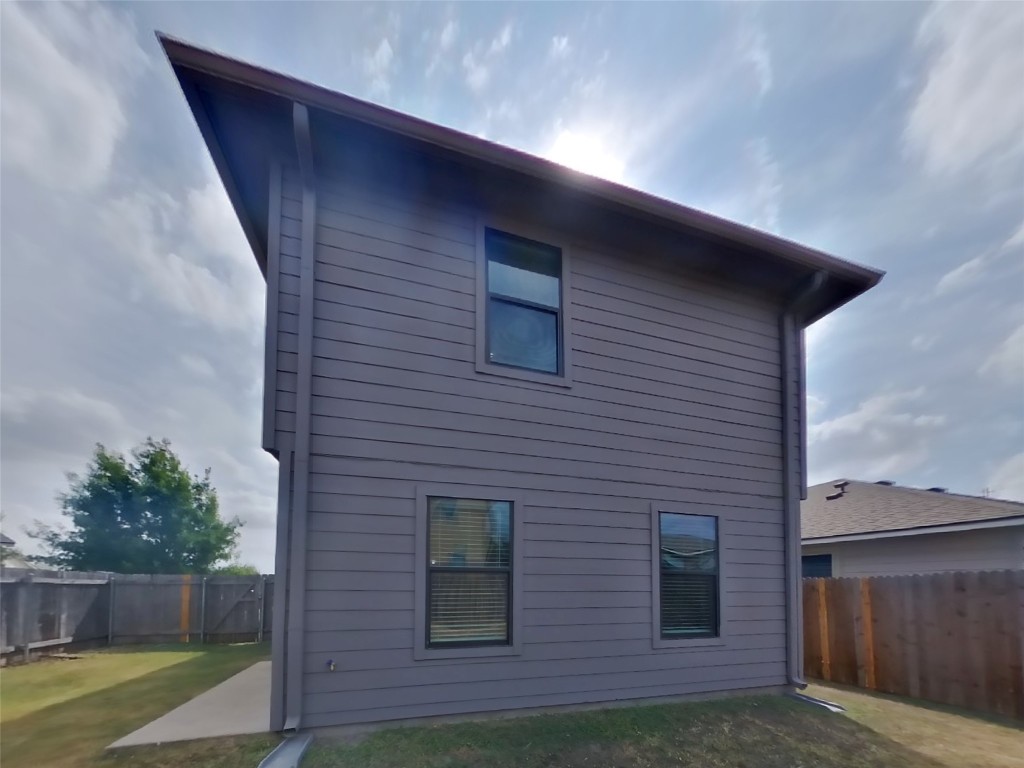 1027 Trail Driver Cove Georgetown, TX 78626 - Photo 14 of 17 Back of property featuring a fenced backyard