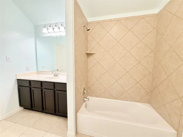 a bathroom with a bathtub