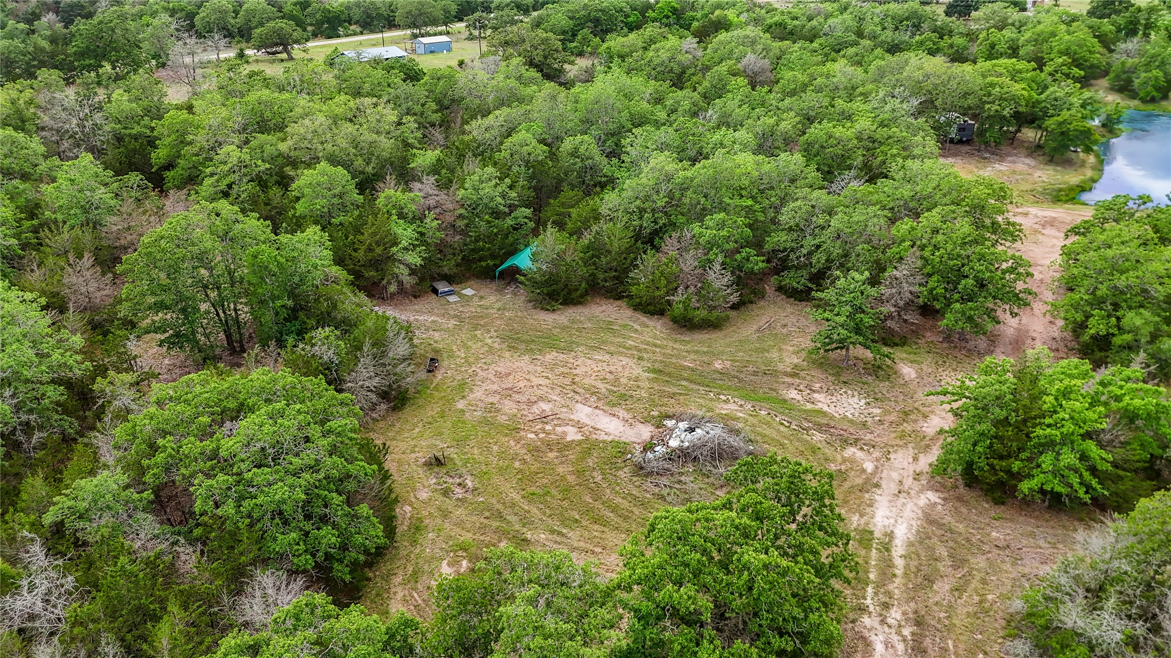 5837 FM 180 Road Ledbetter, TX 78946 - Photo 10 of 16 Planned home site. Septic and well have already been installed!