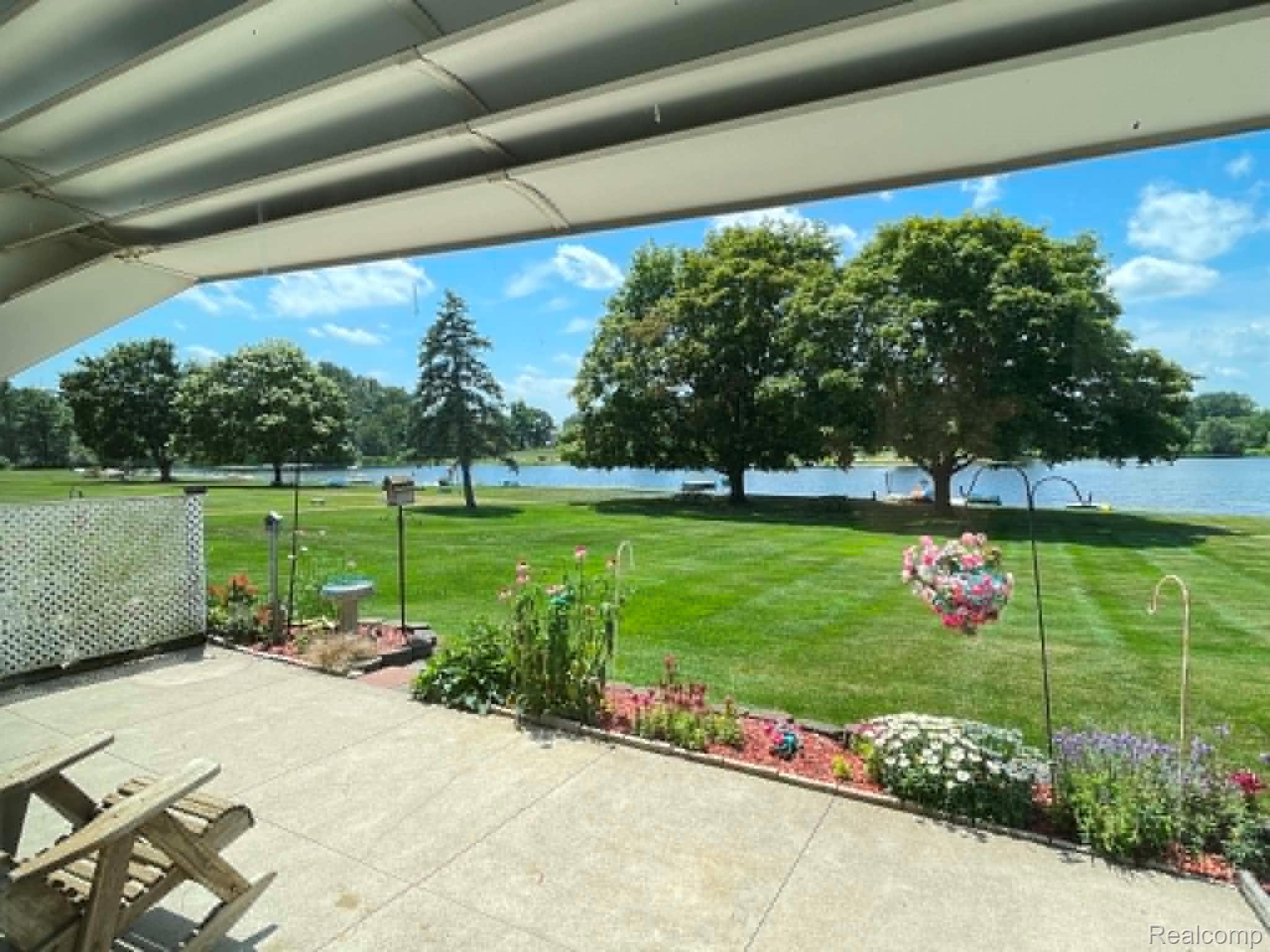 26965 Milford Road, Unit 37 New Hudson, MI 48165 - Photo 10 of 15 Awning