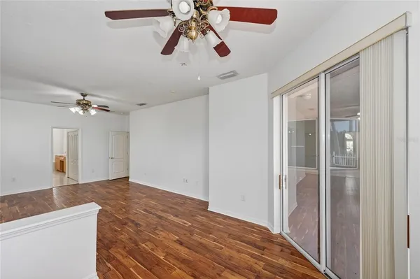 a view of a room with a sink and cabinet