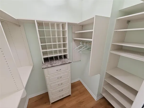 a view of an empty walk in closet