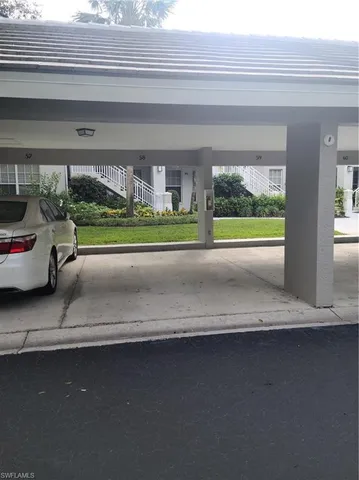 a view of a car park from a window
