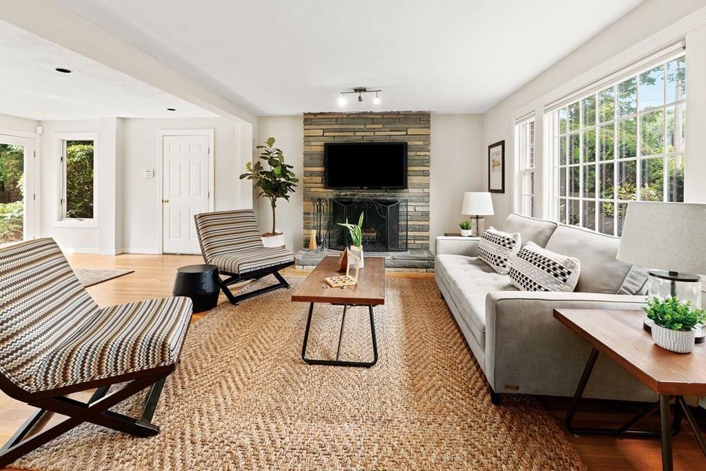 7 Dorothy Road Newton, MA 02459 - Photo 11 of 23 a living room with furniture fireplace and flat screen tv