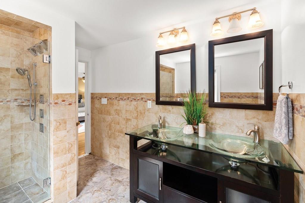 7 Dorothy Road Newton, MA 02459 - Photo 15 of 23 a bathroom with a sink and a mirror