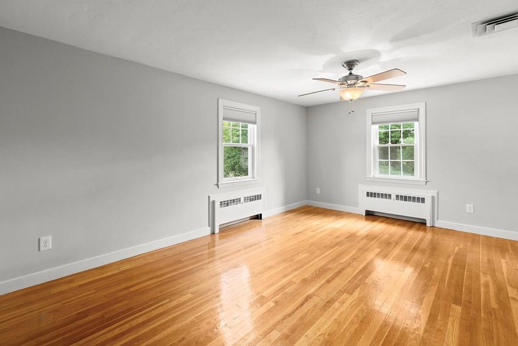 7 Dorothy Road Newton, MA 02459 - Photo 19 of 23 wooden floor in an empty room with a window