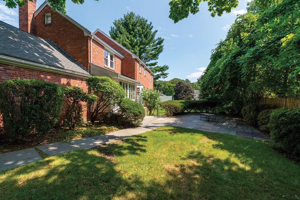 7 Dorothy Road Newton, MA 02459 - Photo 22 of 23 a view of a swimming pool with an outdoor seating and a yard