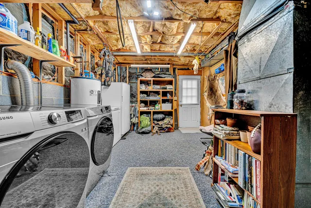 a utility room with dryer and washer