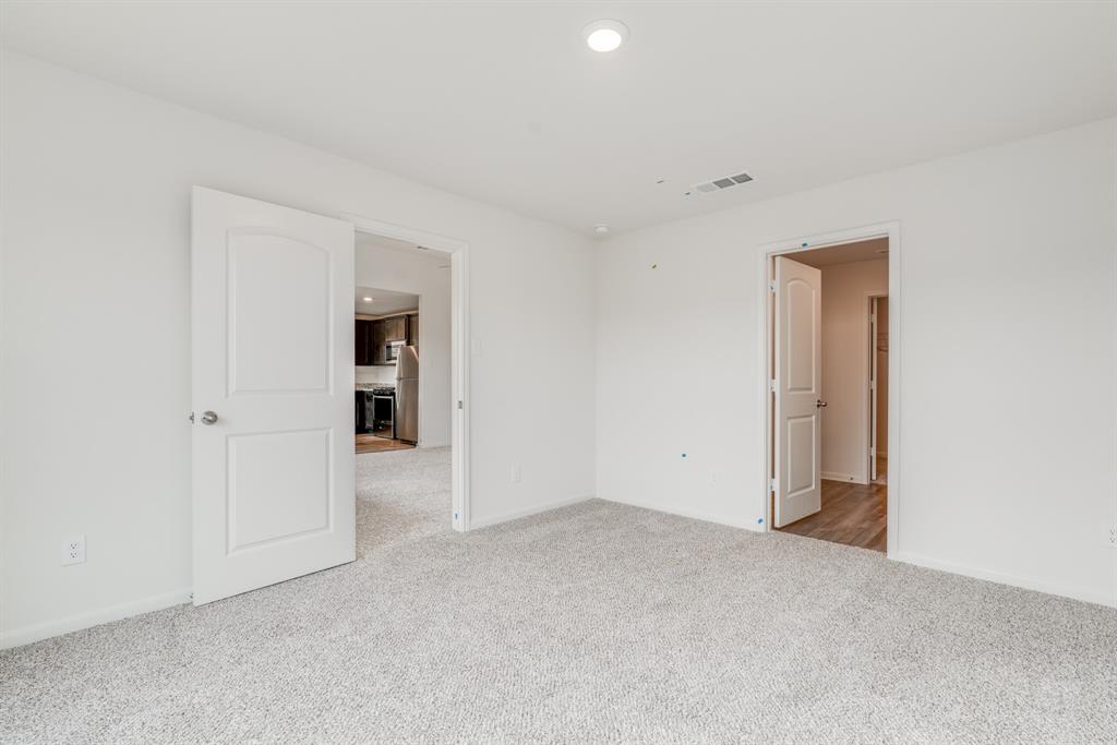 232 Micah Lane Ferris, TX 75125 - Photo 25 of 32 an empty room with closet area