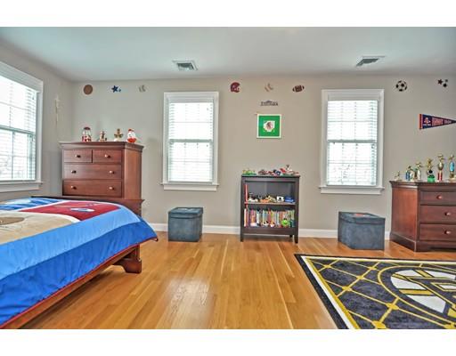 82 Edwardel Road Needham, MA 02492 - Photo 16 of 25 a bedroom with a bed and wooden floor