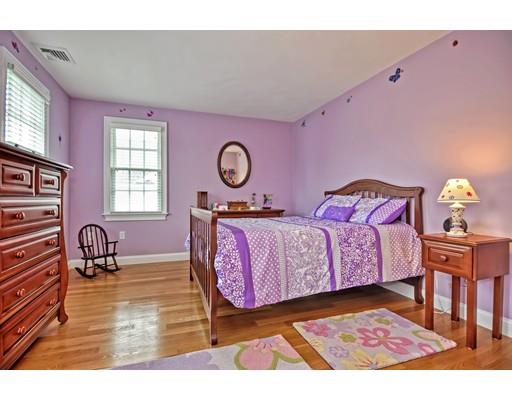 82 Edwardel Road Needham, MA 02492 - Photo 17 of 25 a bedroom with a bed and wooden floor