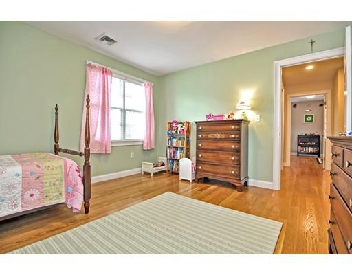 82 Edwardel Road Needham, MA 02492 - Photo 18 of 25 a bedroom with a bed and wooden floor