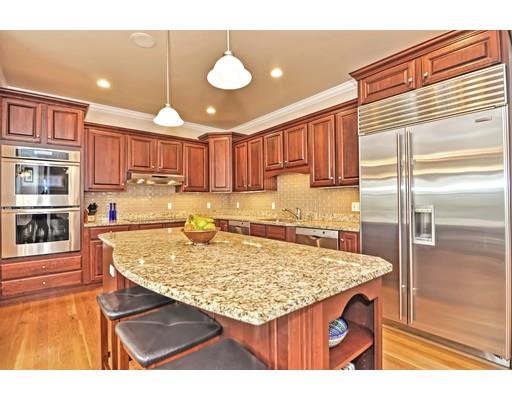 82 Edwardel Road Needham, MA 02492 - Photo 3 of 25 a kitchen with a sink refrigerator and cabinets