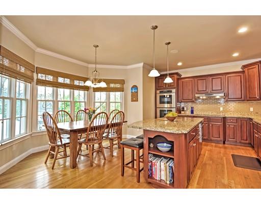 82 Edwardel Road Needham, MA 02492 - Photo 5 of 25 a view of a dining room with furniture window and wooden floor