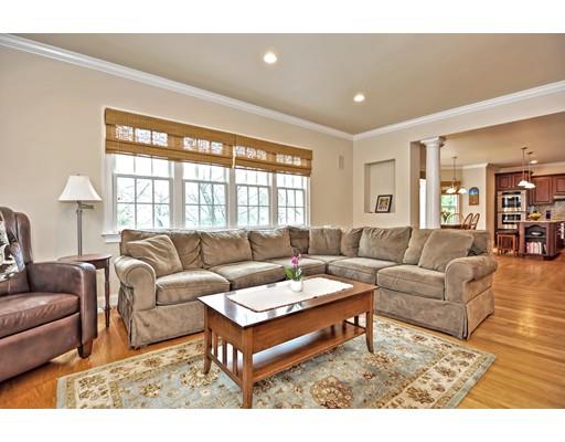 82 Edwardel Road Needham, MA 02492 - Photo 7 of 25 a living room with furniture a rug and a large window