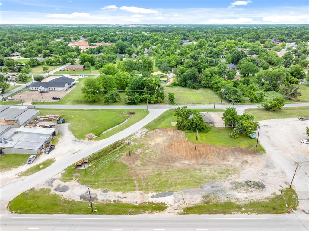 1008 South Virginia Street Terrell, TX 75160 - Photo 11 of 22 a view of a swimming pool with a yard