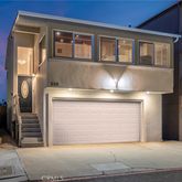 a front view of a house with a garage