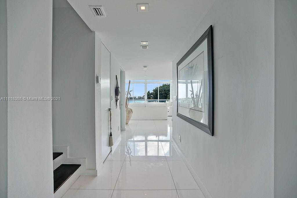 2127 Brickell Avenue, Unit 503 Miami, FL 33129 - Photo 3 of 54 a view of a hallway to the kitchen