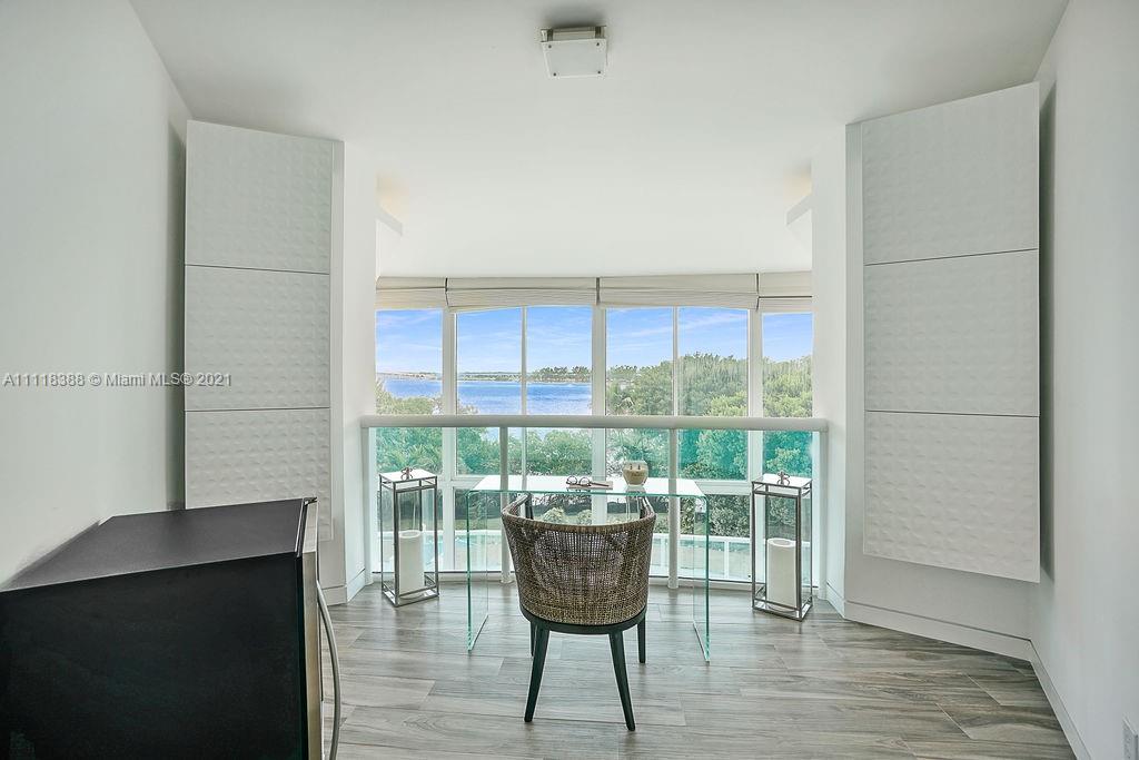2127 Brickell Avenue, Unit 503 Miami, FL 33129 - Photo 40 of 54 a view of a chair and table in a room