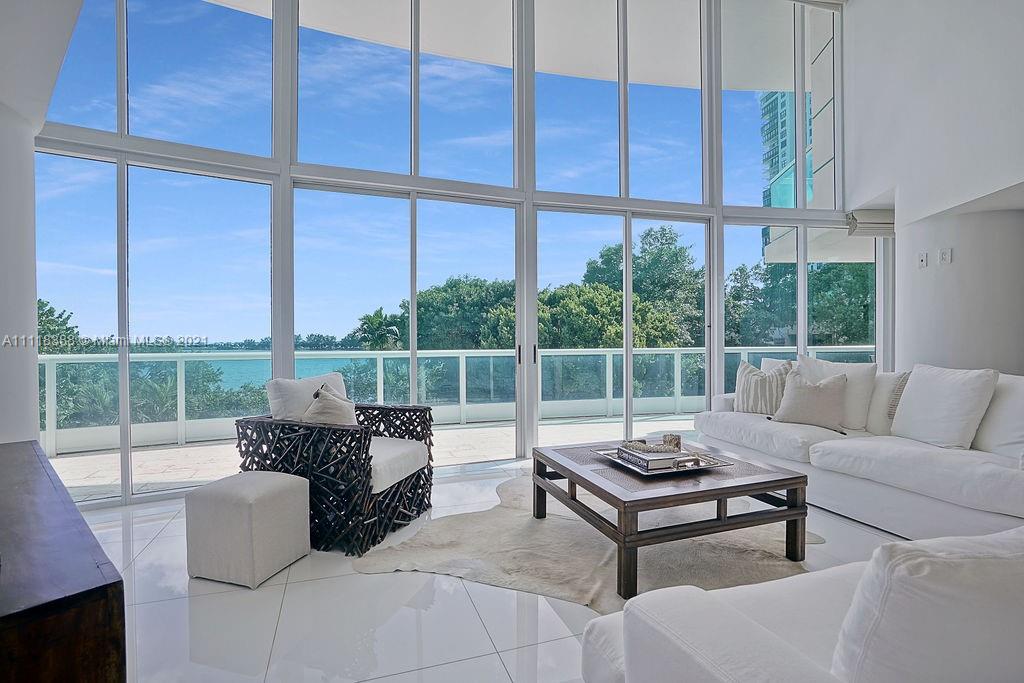 2127 Brickell Avenue, Unit 503 Miami, FL 33129 - Photo 5 of 54 a living room with furniture and a window