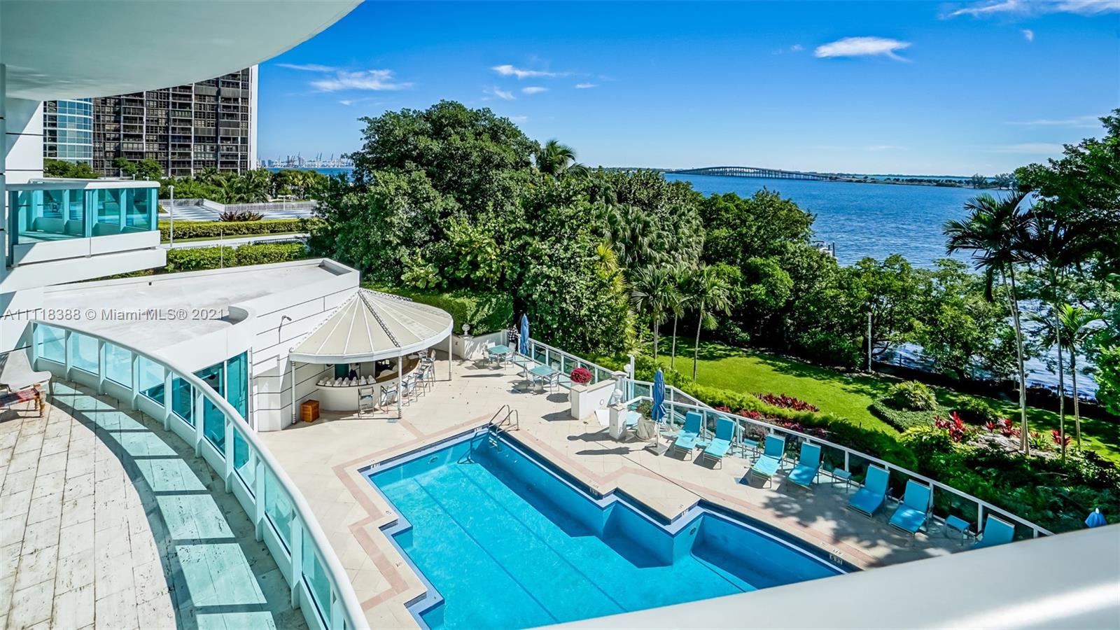 2127 Brickell Avenue, Unit 503 Miami, FL 33129 - Photo 50 of 54 a view of a balcony with chairs and a table