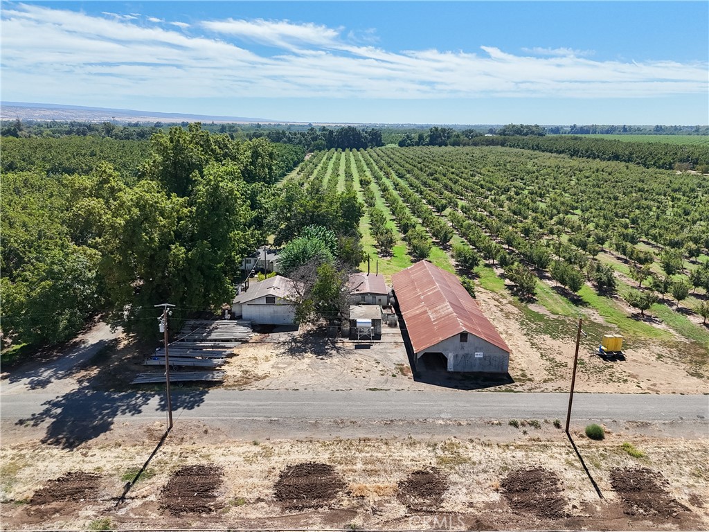 24365 Oklahoma Avenue Red Bluff, CA 96080 - Photo 18 of 20 a roof deck with lawn chairs and wooden fence
