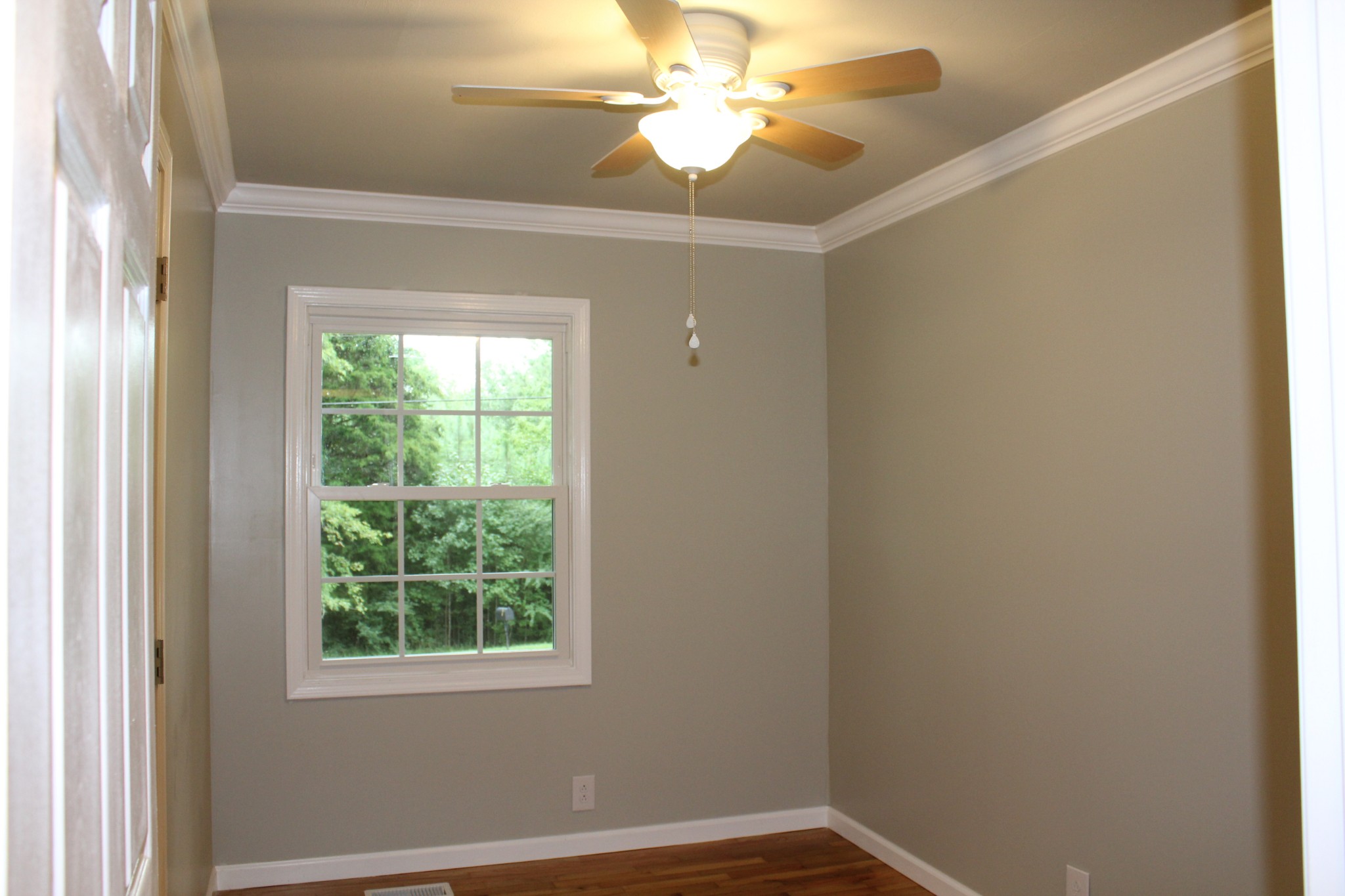 70 Pond Drive Tennessee Ridge, TN 37178 - Photo 11 of 28 a view of a room with a window and a fan